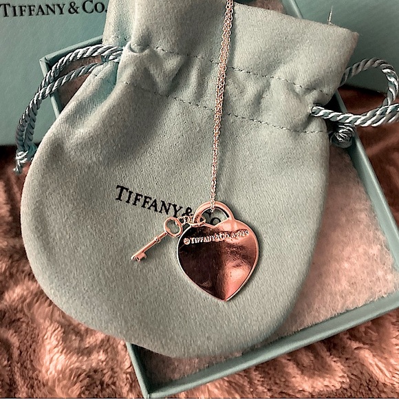 Authentic Tiffany & Co. Silver Heart Stamped Pendant and Key Necklace. - Picture 11 of 16